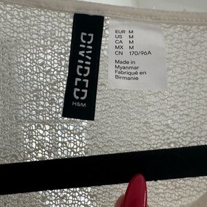 Cute sheer cream sweater with ruffle detailing NWOT